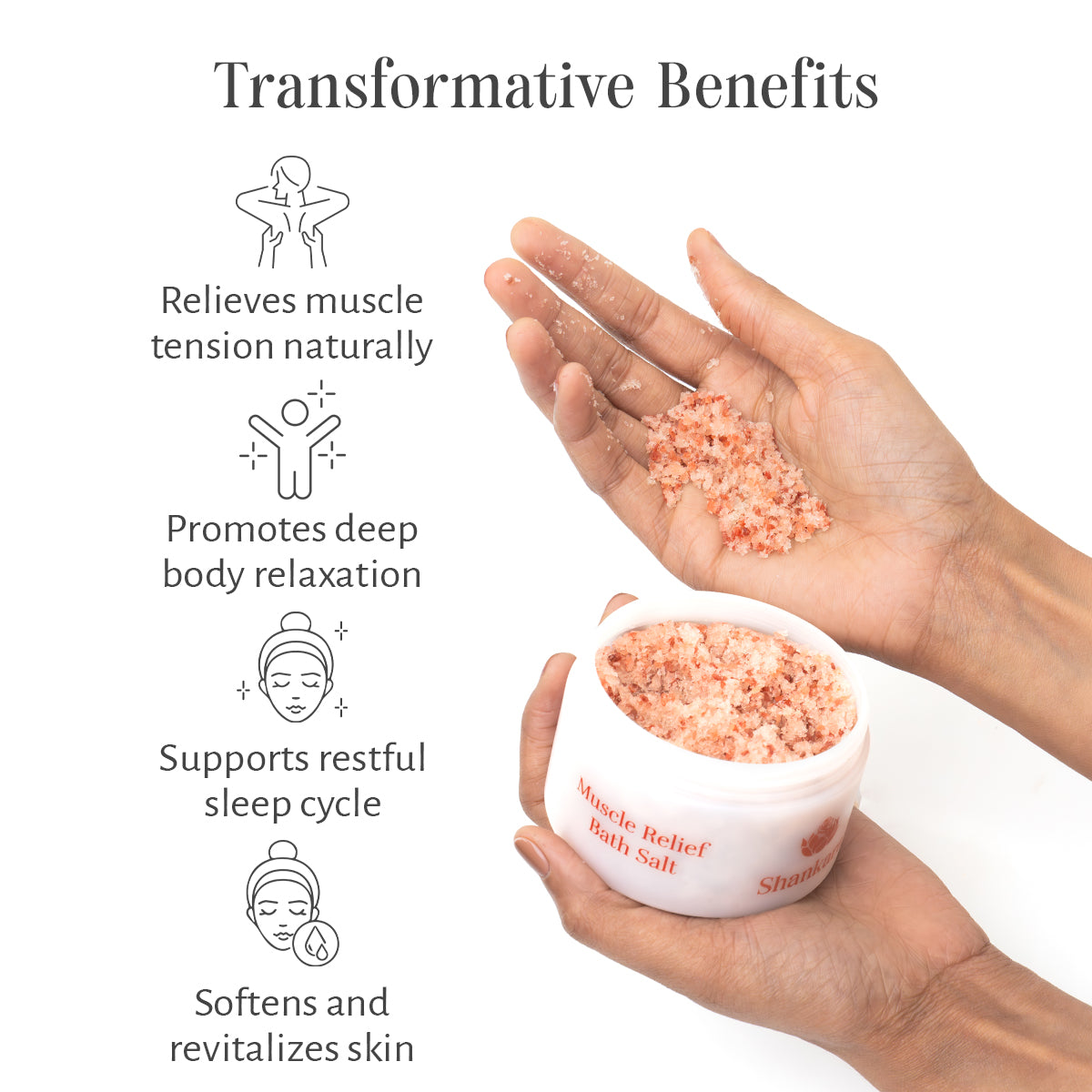 Hand holding a container of bath salt with text listing benefits on a white background
